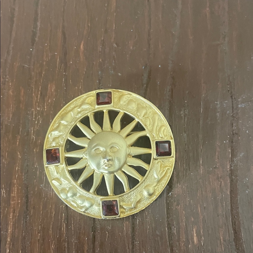 NYPL Gold Sunburst Round Brooch with Deep Red Stones